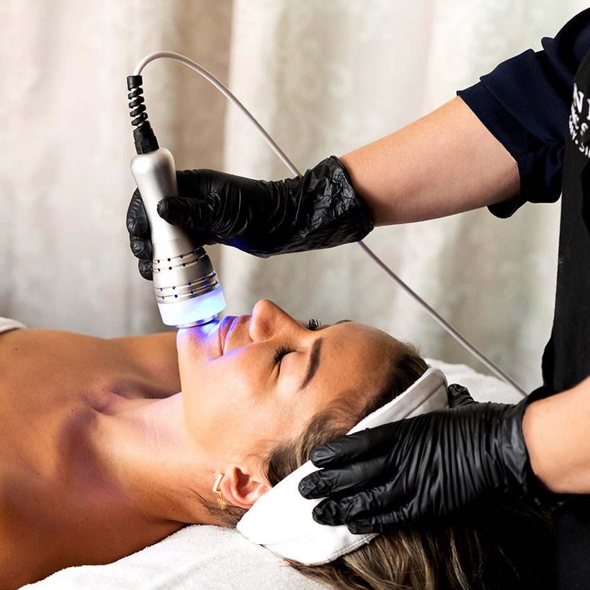 Woman getting an organic skin therapy service at Natural Balance Massage Therapy & Wellness Center in Palm Harbor, Florida.