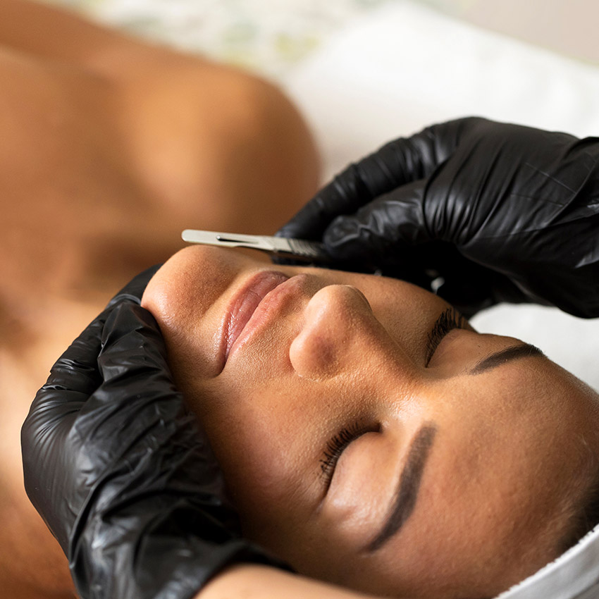 Woman receiving a dermaplaning at Natural Balance Massage Therapy & Wellness Center in Palm Harbor, Florida.